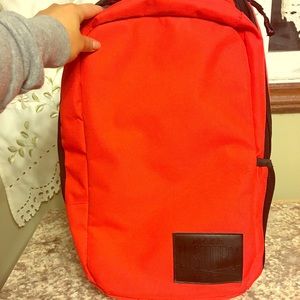 Flag nor fail book bag, red